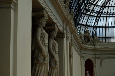 a statue of two women standing next to each other